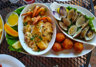 Tony's Restaurant signature dishes Garden Salad With Grilled Shrimp Skewer
Tony's Chowder House Platter
Fried Chicken Strips